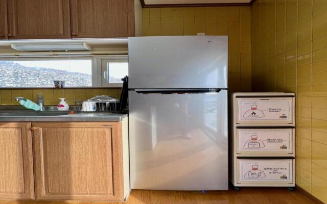 Yellow House by Lake Toya