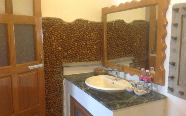 Teak Wood Hotel