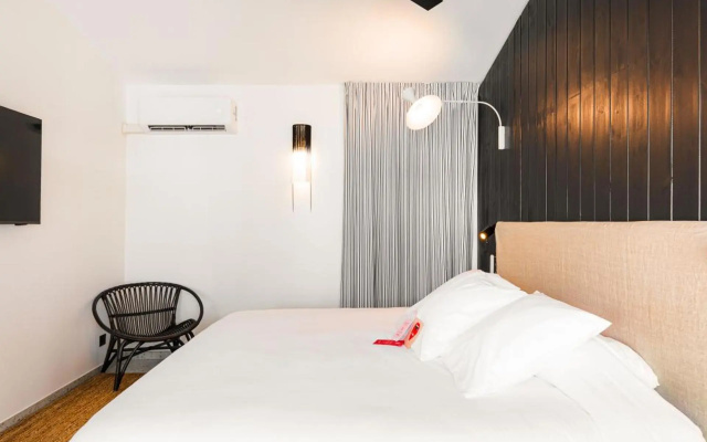 Doudou Hotel by Dina Mogarbine