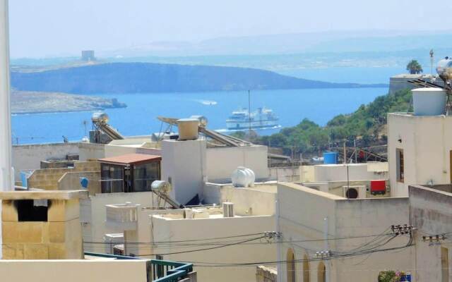 Apartment with 2 Bedrooms in Għajnsielem, with Wonderful Sea View, Furnished Terrace And Wifi