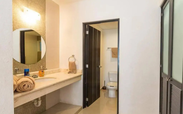Poolside tranquil apartment in Playa del Carmen