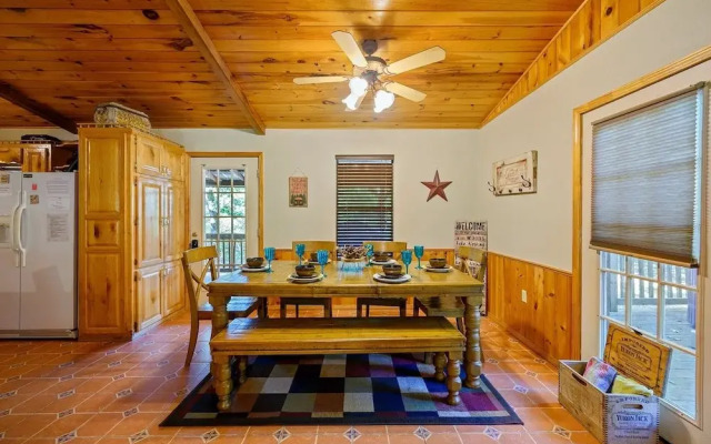 Cast Away Family Cabin with Hot Tub, Fireplace, and Kids Area by RedAwning
