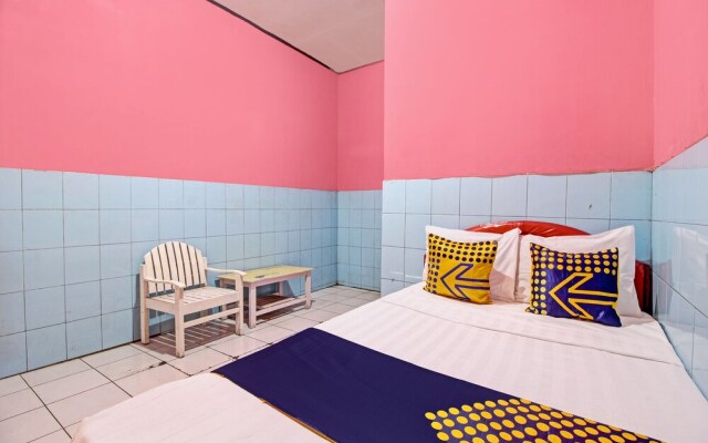 SPOT ON 92791 4 Saudara Hotel