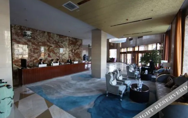 Q+ Huili Mingzhu Business Holiday Hotel