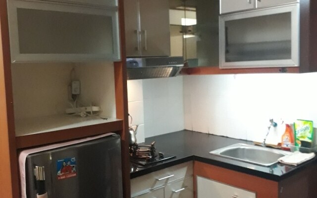 Apartment The Suites Metro by Herlan
