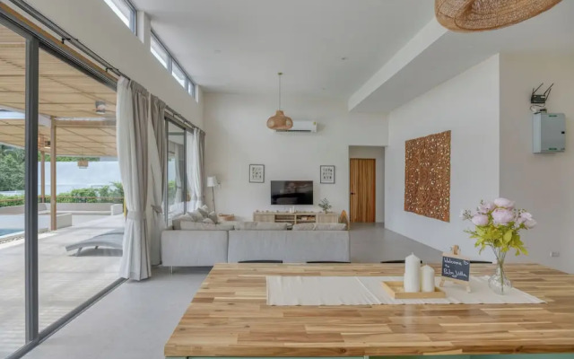 Tropical Poolside Retreat by Sea N' Rent