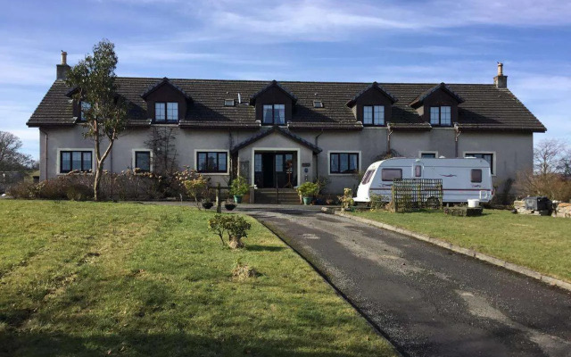 Woodcock Faulds House