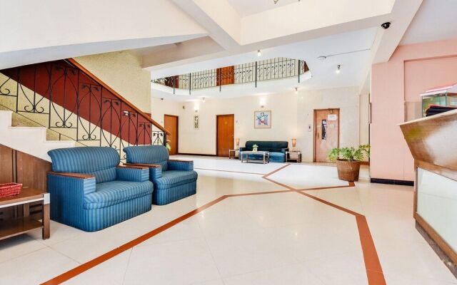 Capital O 49932 Orchard Suites