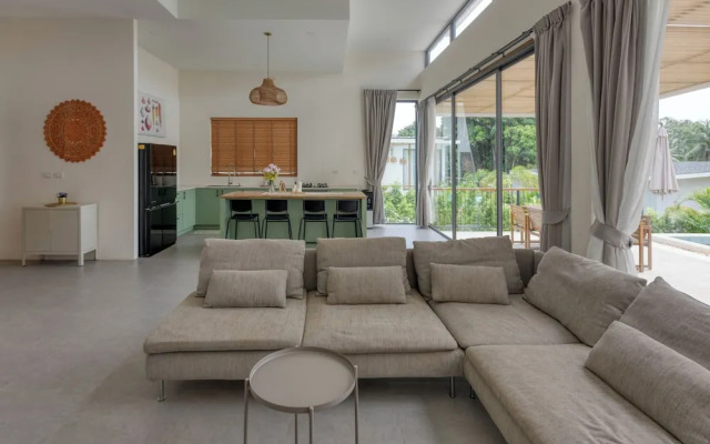 Tropical Poolside Retreat by Sea N' Rent