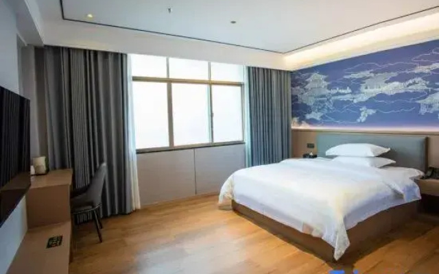 Xinlong Yazhi Hotel (Xinhua West Bus Station)