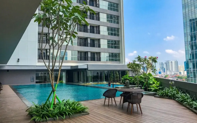 Homey and Warm 1BR at Ciputra World 2 Apartment