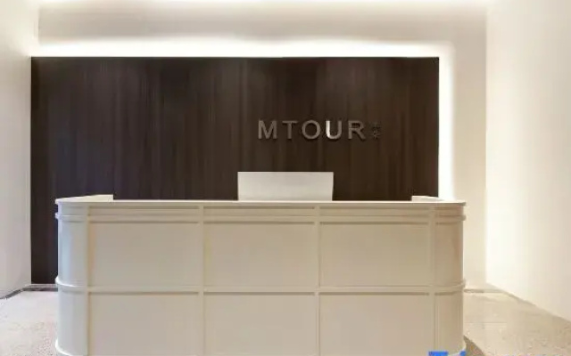 Xiamen Mido Residence Hotel (Gaoqi Airport Banshang Subway Station)