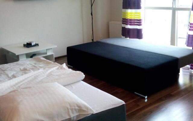 Cosy Inn Apartamenty