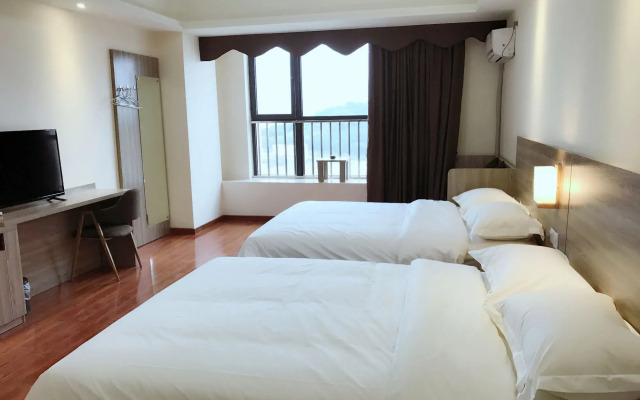 Xingyue Apartment Luogang Wanda