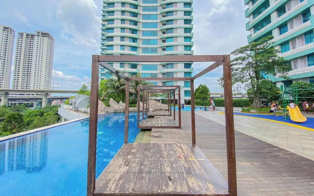 Homey and Restful Studio Grand Kamala Lagoon Apartment