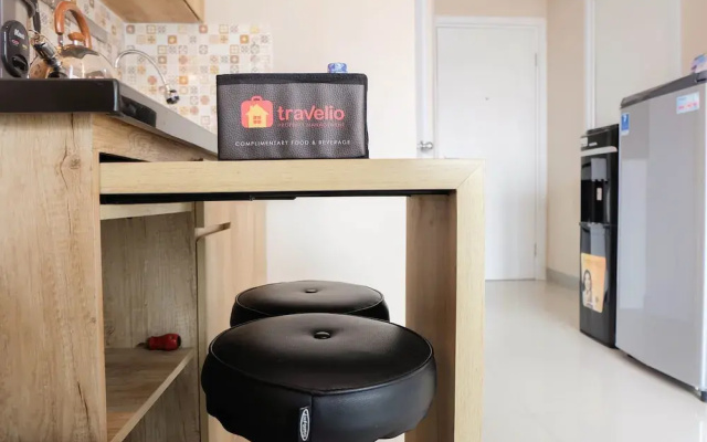 Modern and Bright 2BR Green Pramuka Apartment