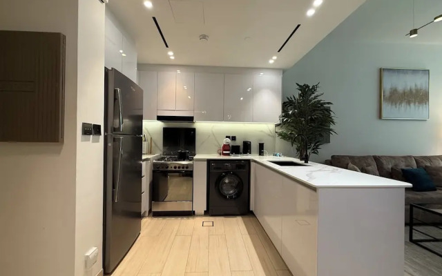 Manzil-1BR in JVC with Pool View