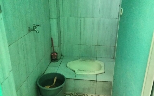 SPOT ON 92839 Nany Asoka Syariah Near Anyong Cafe Studio