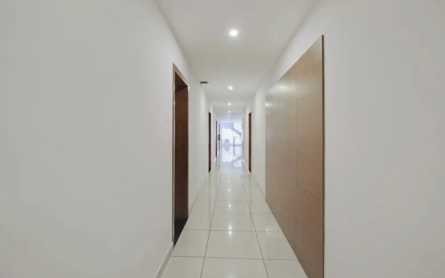 Capital O 22459 Edasserys Kalamassery Tourist Home