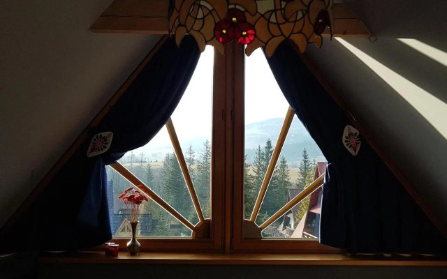 Domek za Strugiem - pokoje i apartamenty