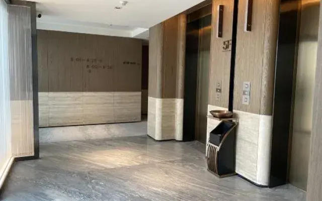 DongGuan Tangxia Vanke Plaza Huaman Hotel