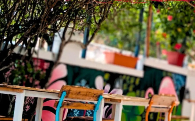 Tribe Inn & Rooftop Lounge