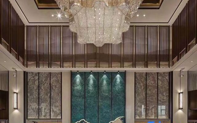 Xinzheng Xingangwanhua Hotel