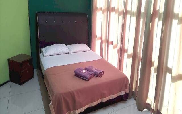 OYO 90937 Tanjak Hotel