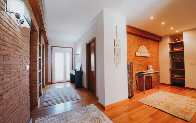 Villa con piscina a pie de playa