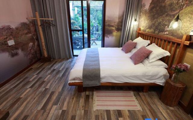 Zhangshe Courtyard Hotel