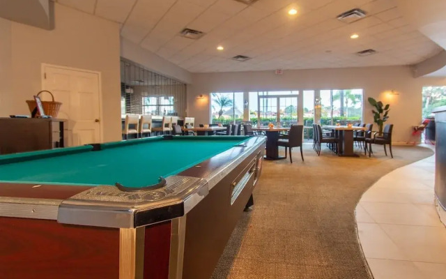Private Screened Splash Pool Overlooking Tranquil Lake Right Beside Disney World by Florida Dream Homes