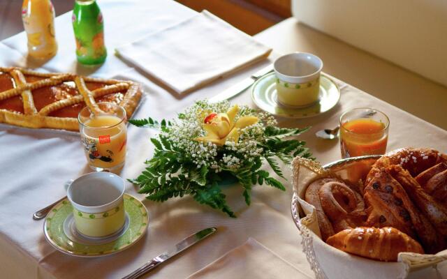 An agritourism complex with views of Assisi.