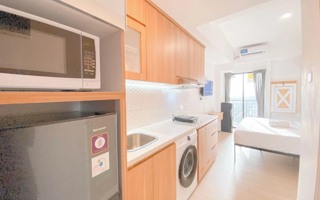 Homey & Restful Studio At Tamansari Panoramic Apartment