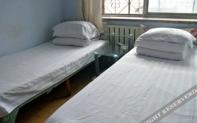 Shihe Business Hotel (Taishan Railway Station Tai'an Bus Terminal)
