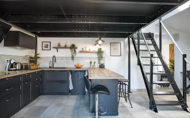 Loft avec jardin et parking privé