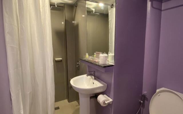 Capital O 820 Guijo Suites Makati