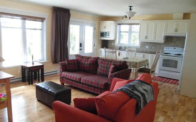 Chalet L'officier-1, spa et vue sur le Fleuve