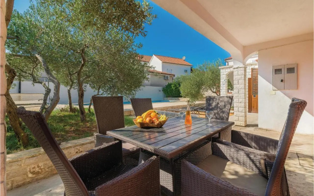 Two-Bedroom Holiday home Jezera with a Fireplace 05
