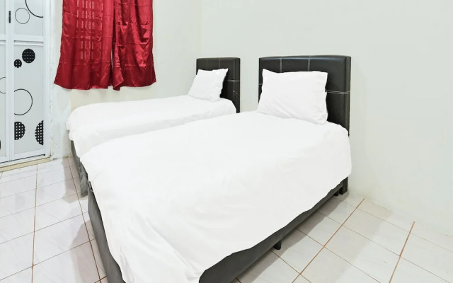 Oyo 90596 Casaria Inn