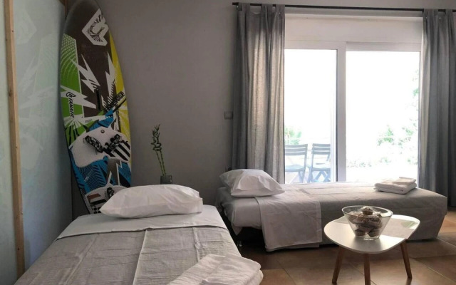 A Cozy Summer Retreat in the Woods of Rhodes