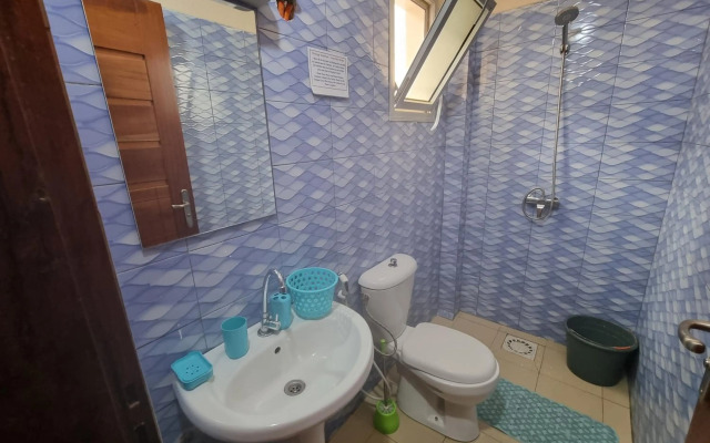 Chambres Privees Climatisees-Douches Personnelles-Neflix-Salon