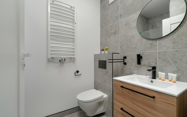 Dark Grey Apartment in Poznan by Renters