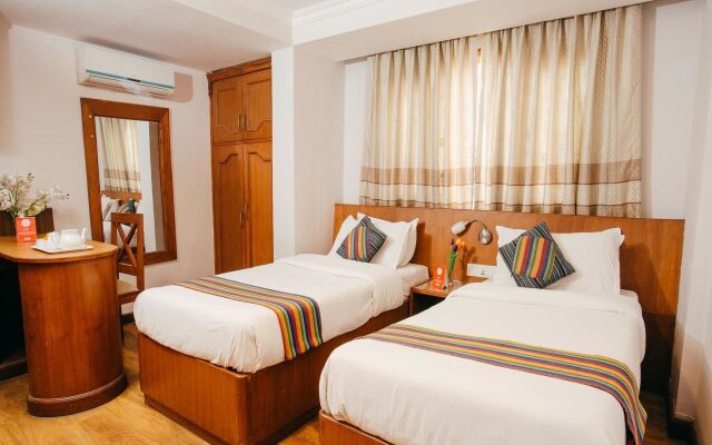 Osho Holiday Inn by OYO Rooms