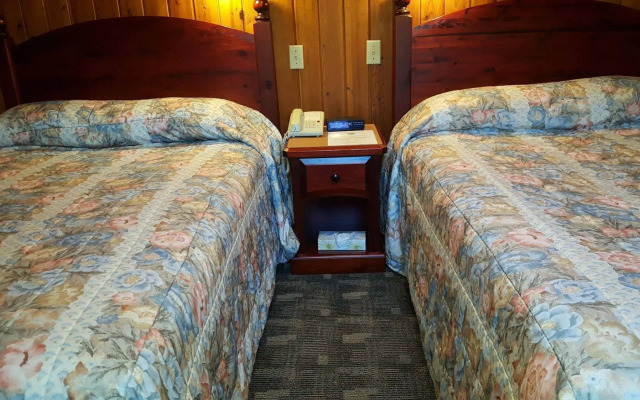 The Cedarwood Inn & Suites