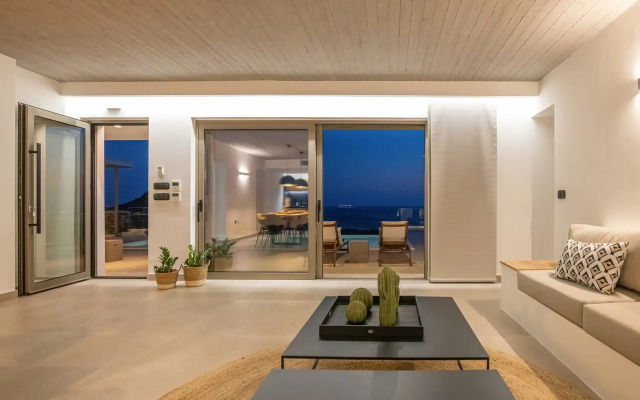 Monogram Travel Tinos