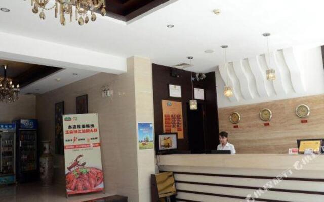 New Lotus Business Hotel (Taojialing Metro Store Renxinhui)
