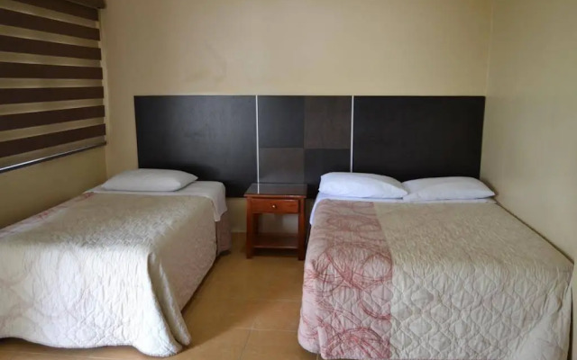 Urdesa Suites Hotel