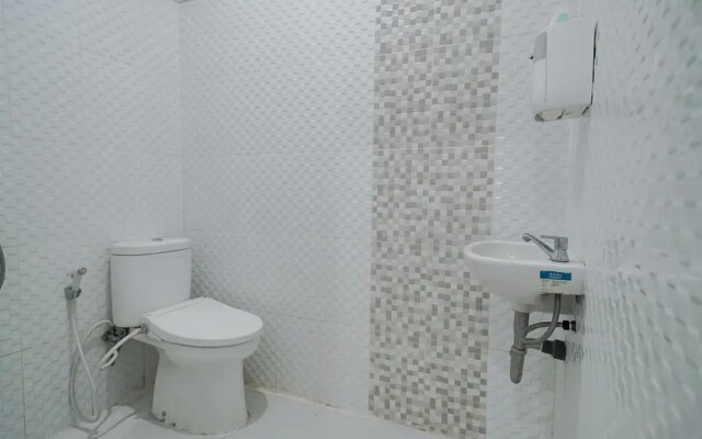 Urbanview Hotel Bari Syariah Palembang By RedDoorz