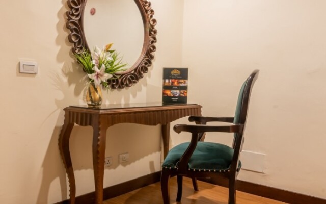 The Grand Palace Suites & Hotel