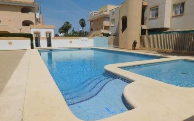 Bungalow en residencial con piscina